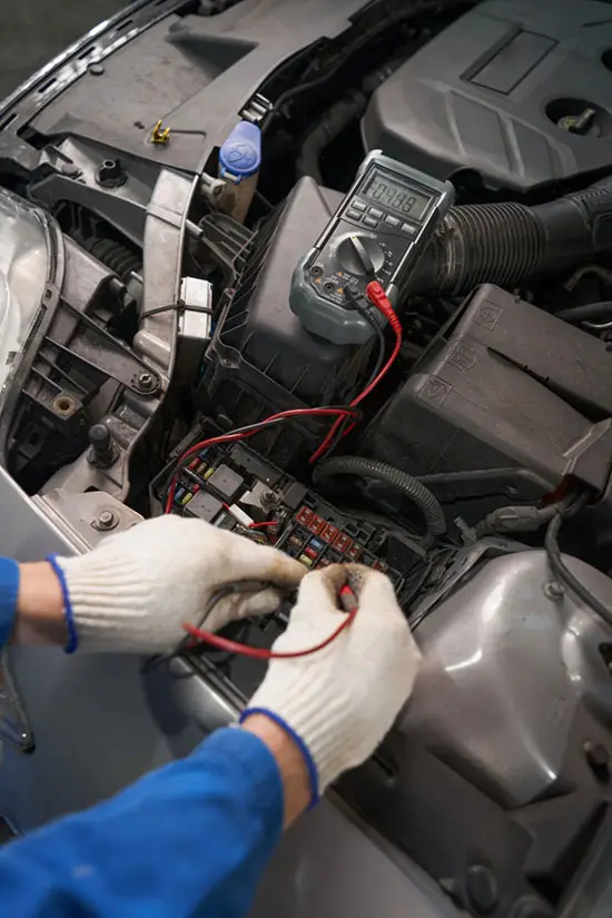 Mobile jumpstart specialist attending a stranded car in Dublin